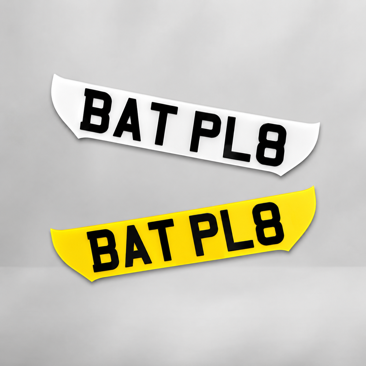 Batman bat-wing shaped number plate with raised black characters
